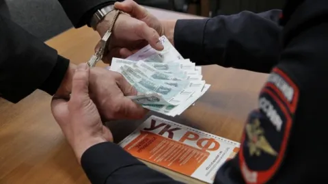 Взятка. Полиция. Наручники.